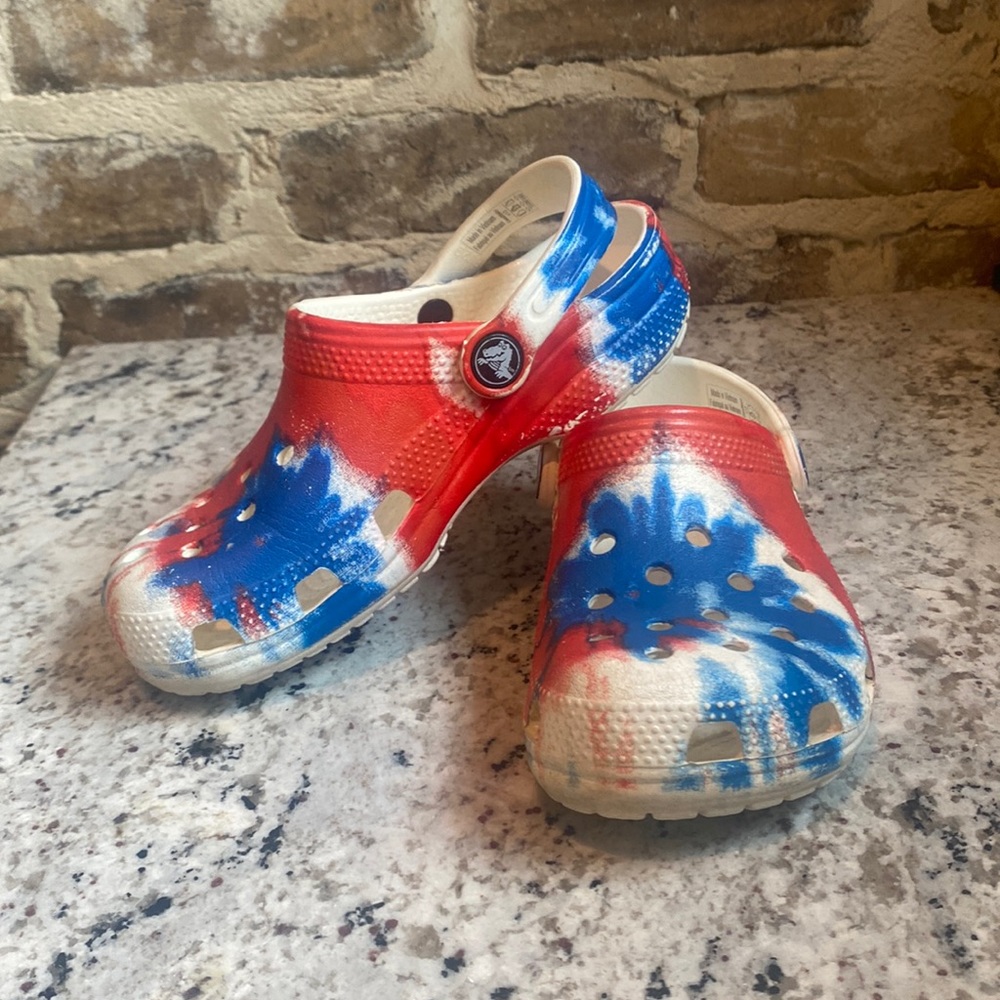 Crocs red white blue tie dye.